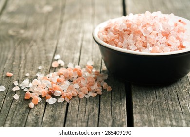 Himalayan Salt On Old Wooden Table