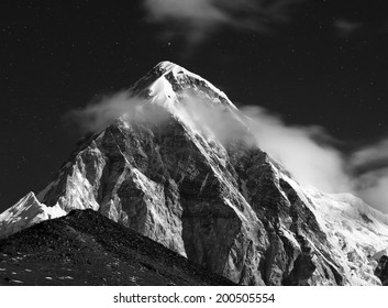 Himalayas At Night. Mt. Pumori (Pumo Ri). Everest Region, Nepal. Black And White