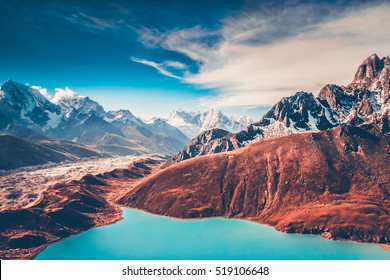 Himalayas. View from Gokyo Ri, 5360 meters up in the Himalaya Mountains of Nepal, snow covered high peaks and lake not far from Everest.