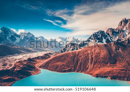 Himalayas. View from Gokyo Ri, 5360 meters up in the Himalaya Mountains of Nepal, snow covered high peaks and lake not far from Everest.