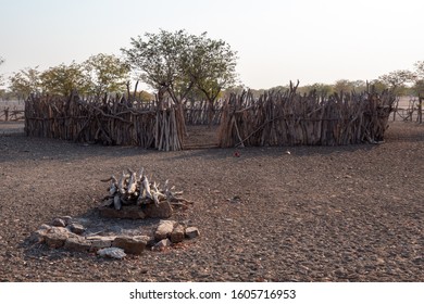 Himba Village - Traditional Fireplace For The Sacred Ancestral Fire And Cattle Enclosure Near Opuwo, Namibia