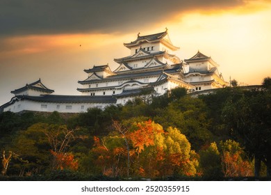 Himeji Castle, White Egret Castle or White Heron Castle, Lanscape view of hilltop Japanese castle complex situated in Himeji with sunset sky background autumn season, Himeji, Hyogo Prefecture, Japan - Powered by Shutterstock