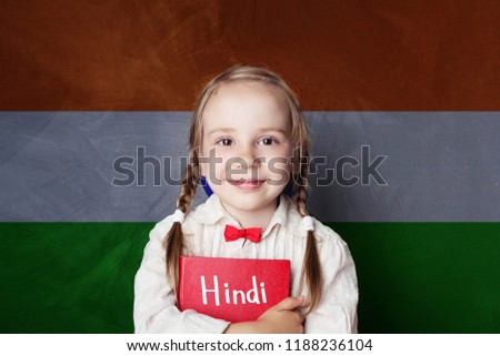 Hindi concept with little girl student against the India flag background. Learn hindi language