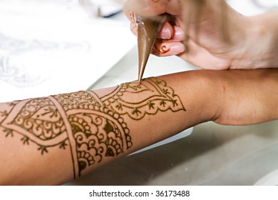 A Hindu Bride has Henna applied to her hands