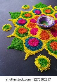 Hindu Colour Kolam Create With Colour Bean And Rice Deco In A Dark Grey Floor Or Background.