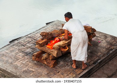 Hindu Cremation Ritual At The River Ghat