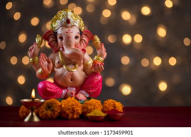 Hindu God Ganesha on Blured bokhe background, Ganesha Idol.