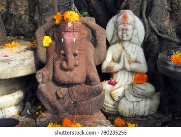 Hindu Gods Statue Under A Tree At Triveni Ghat Rishikesh, India. 