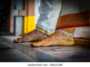 Hindu Indian Wedding Couple Stepping Into Home Together For The First Time