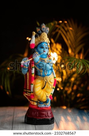 Hindu lord Krishna sculpture, Janmashtami concept image, Vishukani special photography