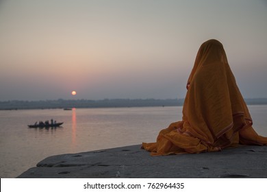 Hindu Monk Is Meditating At Ganges River