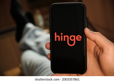 Hinge Logo Of Dating Application On The Screen Of Mobile Phone In Males Hand, June 2021, San Francisco, USA