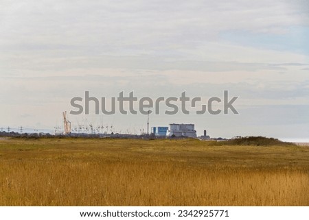 Hinkley Point Nuclear Power Station in distance, landscape, copyspace on top