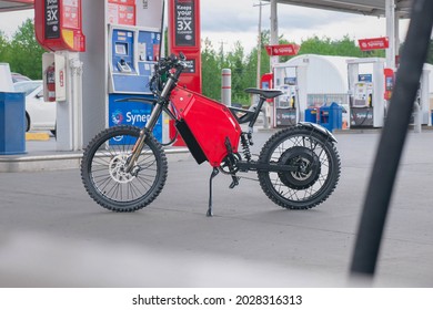 Hinton, Alberta, Canada - 08-20-2021 - Ebike On Gas Station