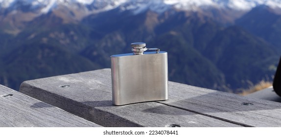 a hip flask on a table