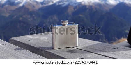 a hip flask on a table