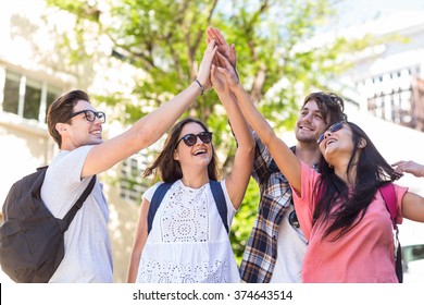 Hip Friends Doing High Five In The Streets