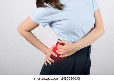 Hip and spine pain problem. young woman with hip and spine problems isolated on white background, back hip pain, people with hip dysplasia. Office syndrome problem concept..