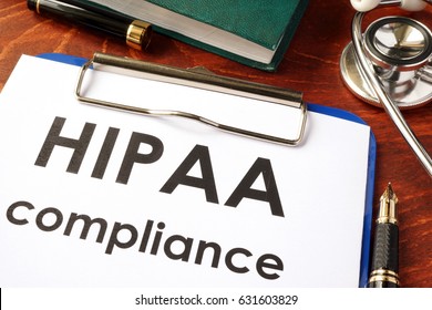 HIPAA compliance form on a clipboard. Medical privacy concept.