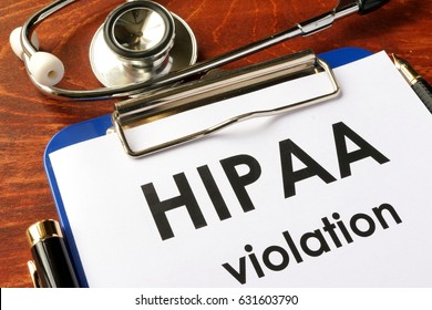 HIPAA Violation Form On A Clipboard. Medical Confidentiality Concept.