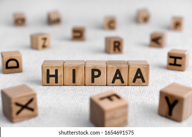 HIPAA - words from wooden blocks with letters, Health Insurance Portability and Accountability Act HIPAA concept, white background