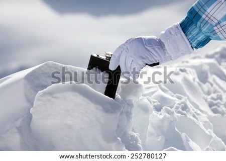 Hipflask in snow