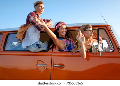 Hippie Friends In A Van On A Road Trip