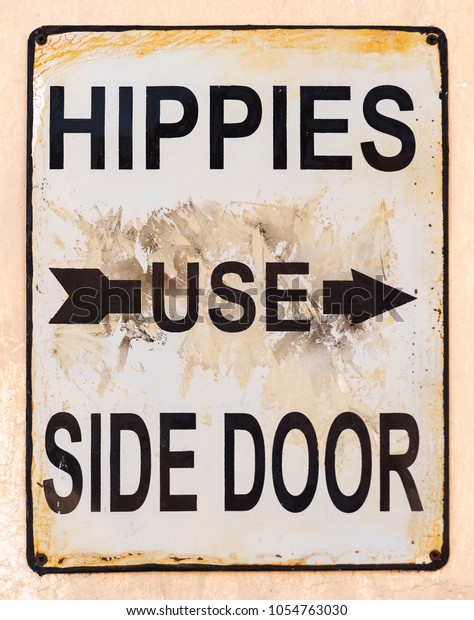 Hippies Use Side Door Sign Arrow Stock Photo Edit Now 1054763030
