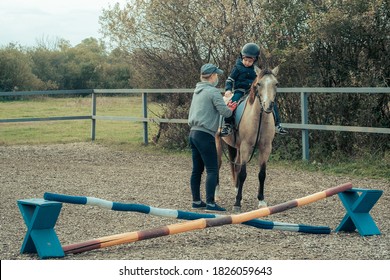 Hippotherapy for young children is the prevention many serious diseases. Concept of spring and summer sports, care, good mood, horse trainings; equistrain club; hippotherapy; vacation and hobby - Powered by Shutterstock