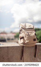 Hipster backpack at sunset background. Tourist traveler bag - Shutterstock ID 2195098423