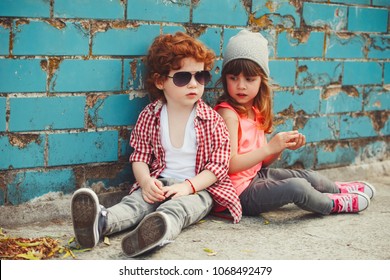 hipster boy and girl in park
