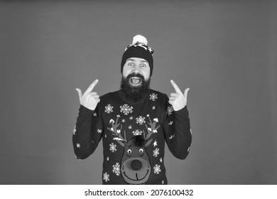 Hipster Cheerful Bearded Man Wear Winter Sweater And Hat. Happy New Year. Join Holiday Party Craze And Host Ugly Christmas Sweater Party. Feeling Awesome. Buy Festive Clothing. Sweater With Deer