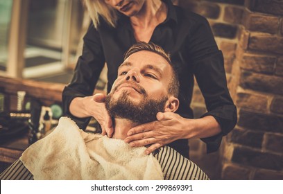 Hipster client visiting  barber shop - Powered by Shutterstock