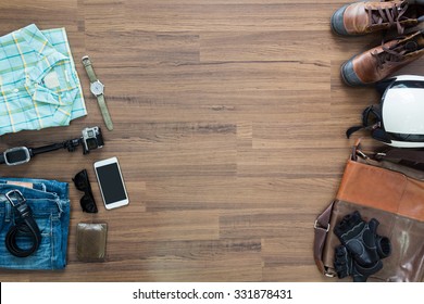 hipster clothes and accessories on a wooden background, View from above with copy workspace