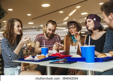 Hipster Friends In Mall Eating Fast Food