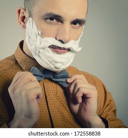 Hipster. Funny Portrait Of Trendy Man With Moustache And Beard Of Shaving Foam, Toned.