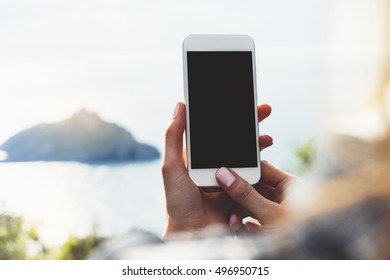 Hipster Girl Texting Message On Smartphone Mobile Close Up, View Tourist Hands Using Gadget Phone On Device Travel On Background Green Mountains Landscape; Finger Touch Blank Screen Cellphone Mockup