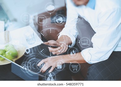 hipster hand using digital tablet docking keyboard and mobile payments online business,omni channel,sitting on sofa in living room,Social distancing and Working from home concept.