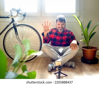 Hipster Latin Spanish Man Making A Video Call With A Smart Phone In An Apartment