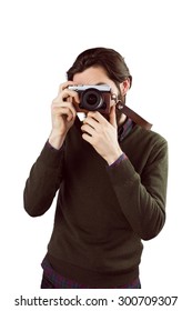 Hipster using his vintage camera on white background