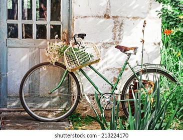 Hipster vintage  Bicycle leaning against grungy wall - Powered by Shutterstock