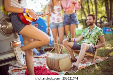 Hipsters having fun in their campsite at a music festival - Powered by Shutterstock