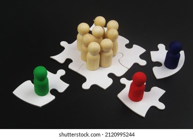 Hire Remote Employees, Team Building, Teamwork Concept. Colorful People Figures On Single Puzzles As Remote Worker And Many Figures Standing Together As Office. 