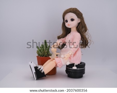 ( Hi-resolution ) Doll  girl sitting on white background