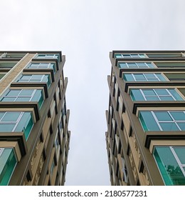 Hi-rise Sky Building Contrast With The White Sky Almost Isolated