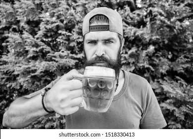 His Drinking Choice. Hipster Drinker. Hipster Holding Beer Mug. Bearded Hipster Drinking Beer On Nature. Hipster Man With Craft Beer. Brutal Man With Drinking Habits. Drinking Only The Best Beer.