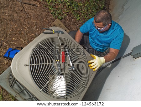 Hispanic air conditioning technician