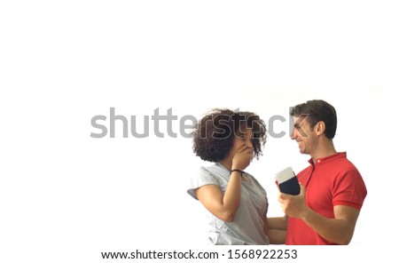 Similar – Brunette surfer woman with top and bikini kissing surfboard