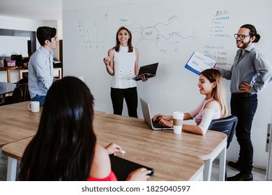 Hispanic Business Woman Working On Laptop In A Modern Office In Mexico Latin America