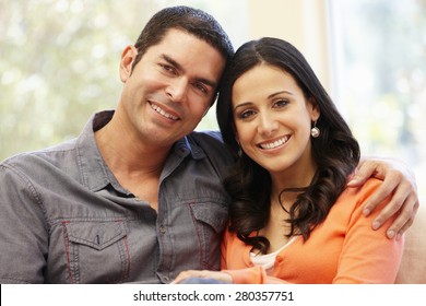 Hispanic Couple At Home